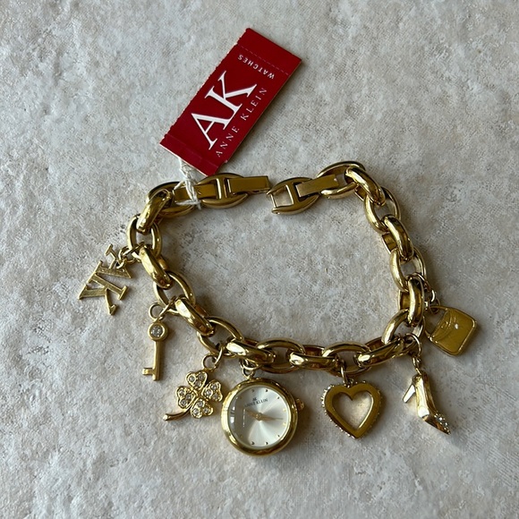 Anne Klein Women Crystal Accented Gold-Tone Charm Bracelet Watch, 10/7604CHRM - Picture 3 of 5
